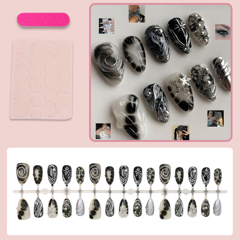 Art nail set with artistic patterns and glitter accents Kalsten