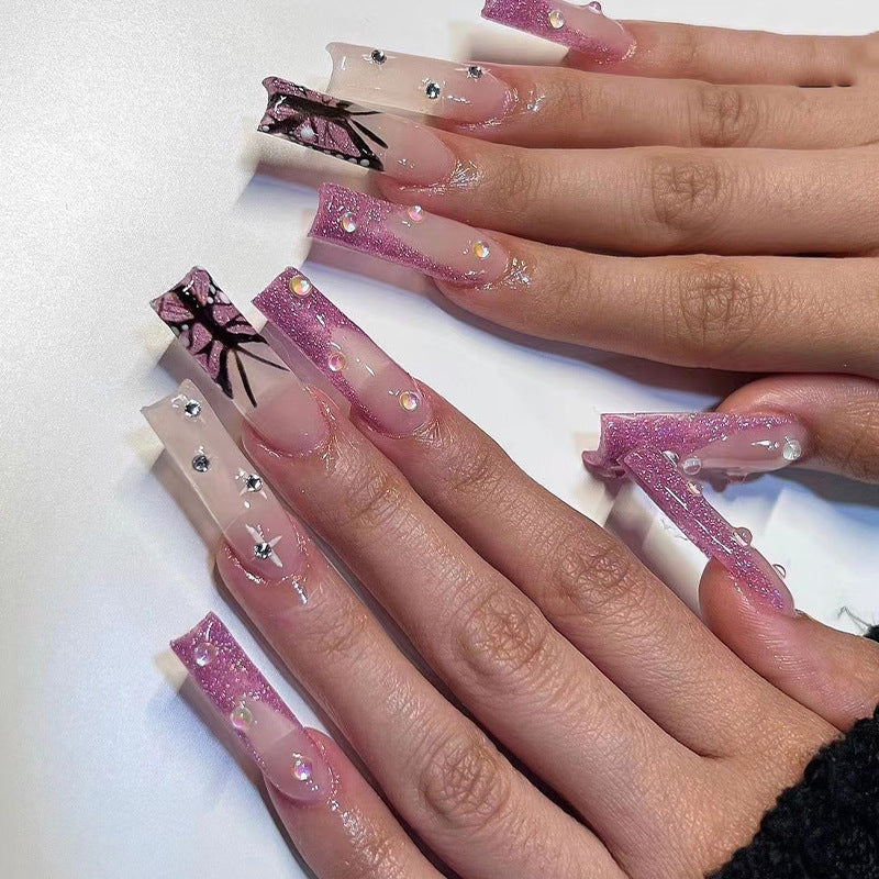 Artful stiletto nails with floral and glittering accents Kalsten