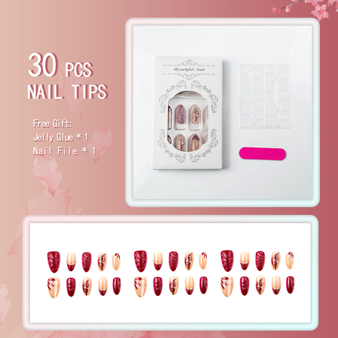 Artificial nail set with filigree golden decorations and romantic heart details Kalsten