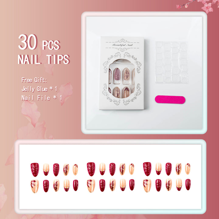 Artificial nail set with filigree golden decorations and romantic heart details Kalsten