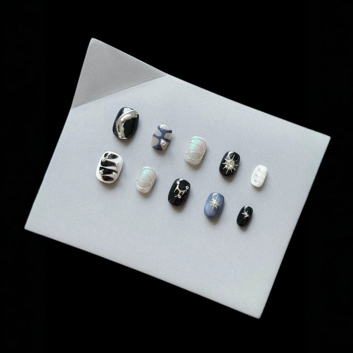 Artistic Press-On Nail Set with Cosmic Themes