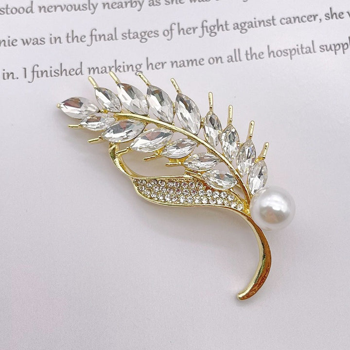 Elegant brooch with glitter stone and pearl Kalsten