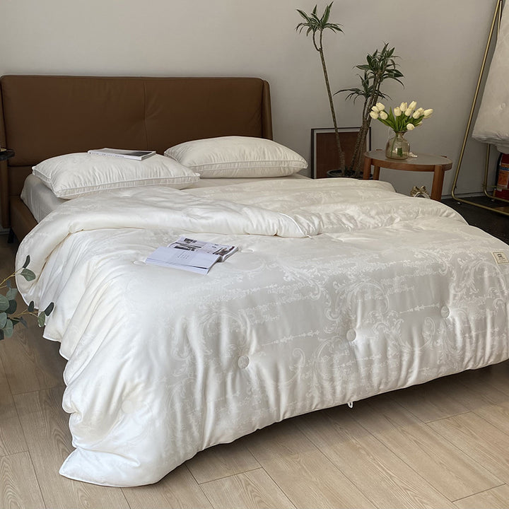 Extra light satin jacquard quilt with subtle button quilting