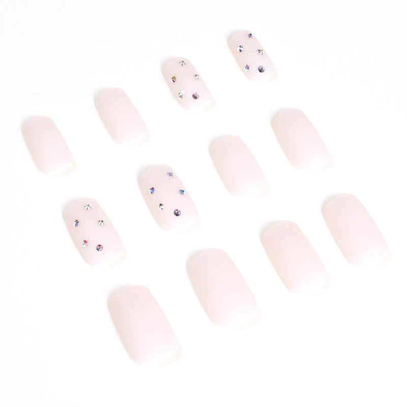 Artistic nail art with elegant rhinestone embellishments Kalsten