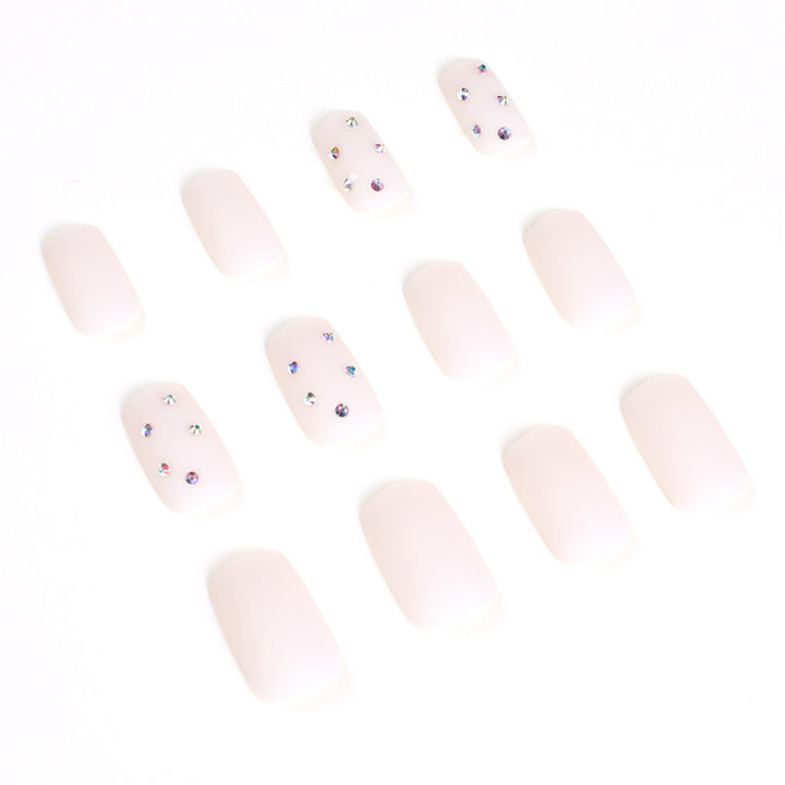 Artistic nail art with elegant rhinestone embellishments Kalsten