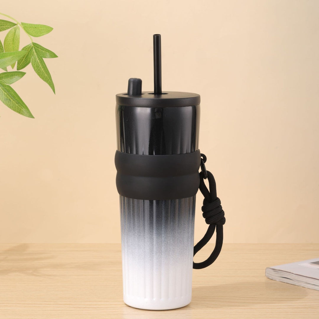 Ladies multifunctional insulated drinking bottle with integrated straw and practical carrying handle Kalsten