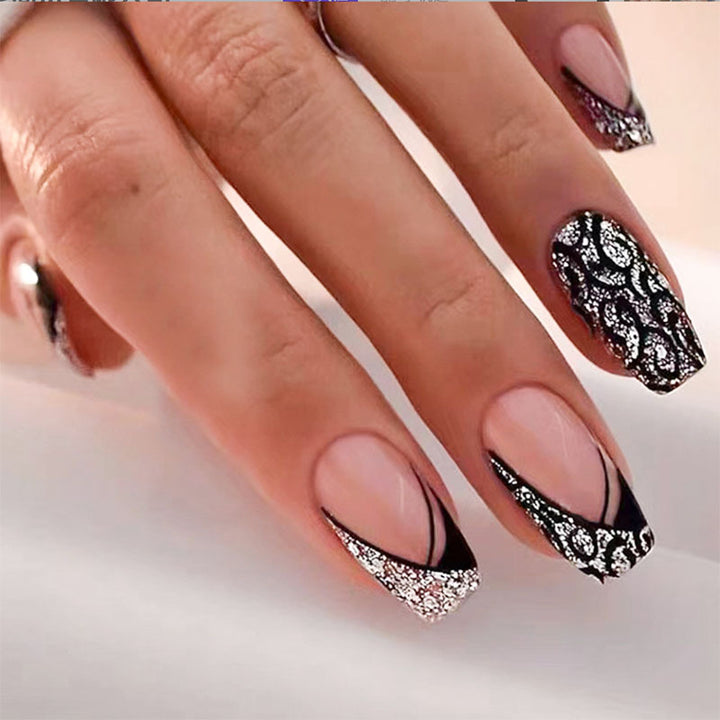Elegant Long-Stiletto Press-On Nails with Intricate Glossy Design