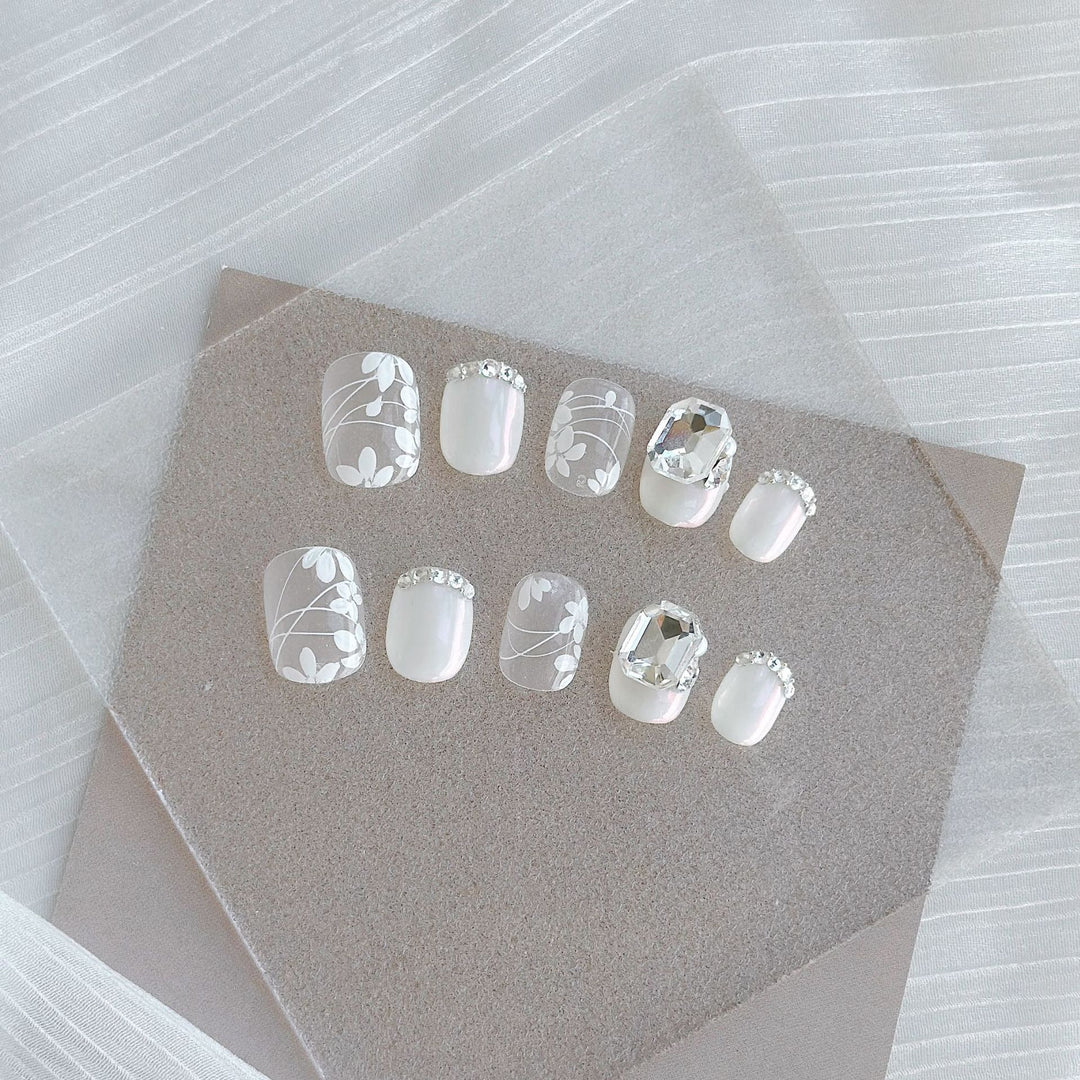 Artistic Press-On Nail Art Set with Heart and Celestial Designs
