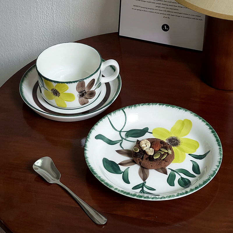 Porcelain cappuccino set with botanical brush painting and elegant rim decoration
