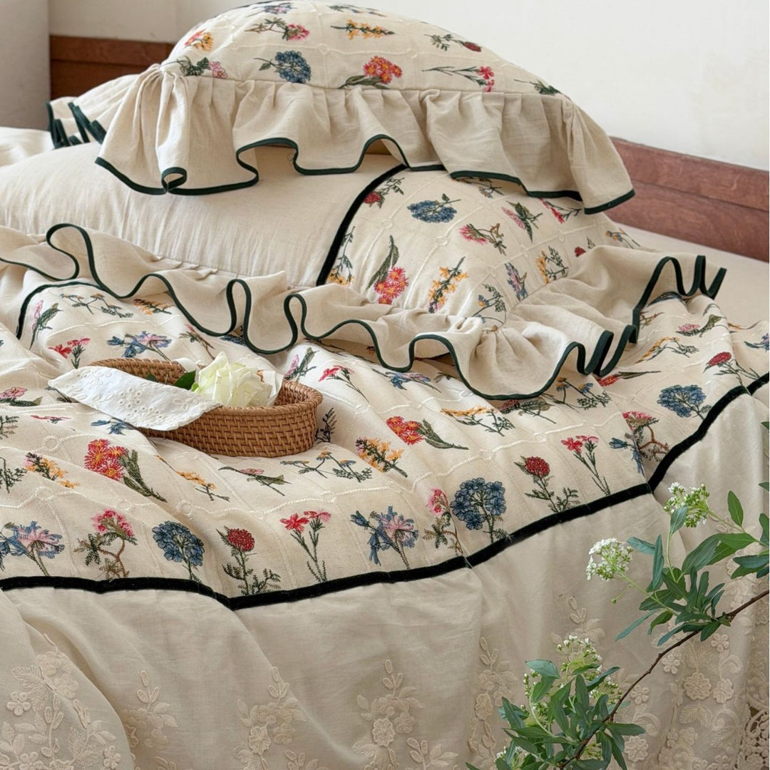 luxurious quilted bedspread set with embroidered lace and flounces