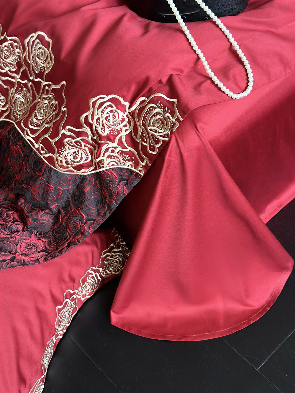 Luxurious satin bedding set with embroidered rose and bow motif