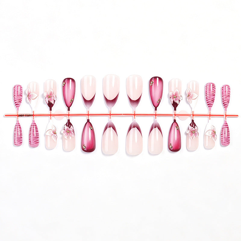 Artificial nail set with floral accents and ombre effect Kalsten