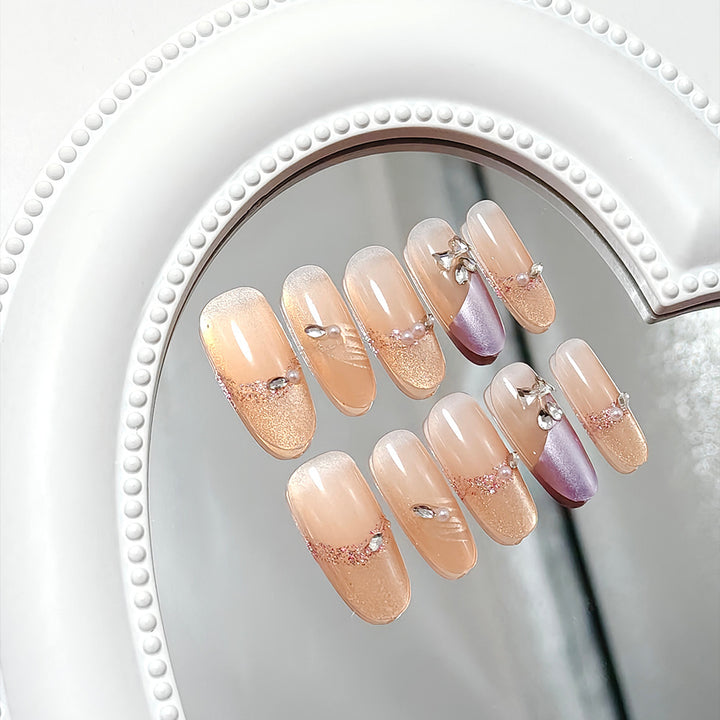 Glamorous artificial nails with rhinestone applications Kalsten