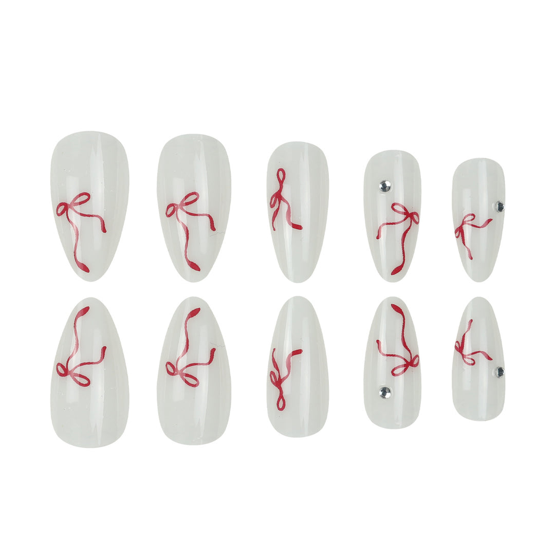 Decorative Stiletto Press-On Nails with Red Ribbon and Gem Embellishments Kalsten