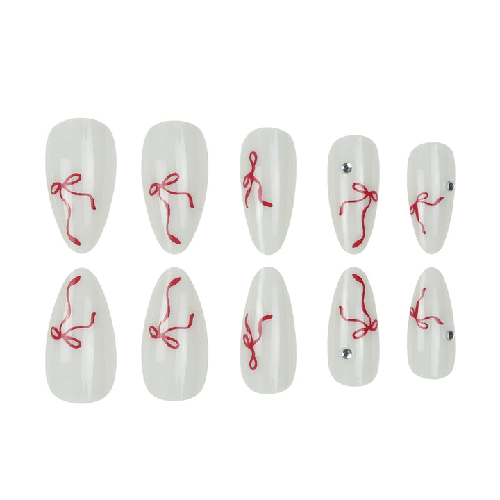 Decorative Stiletto Press-On Nails with Red Ribbon and Gem Embellishments Kalsten