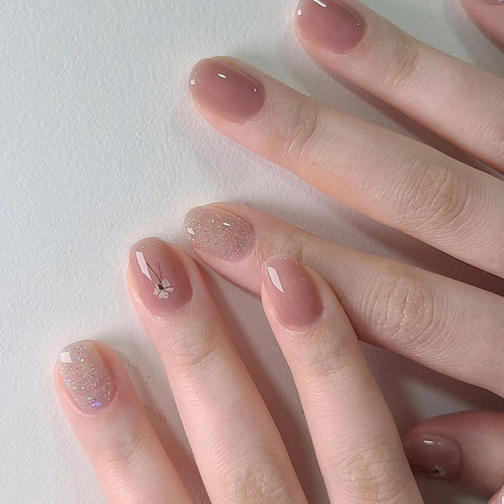 Artificial nails with sparkling accents and floral design Kalsten