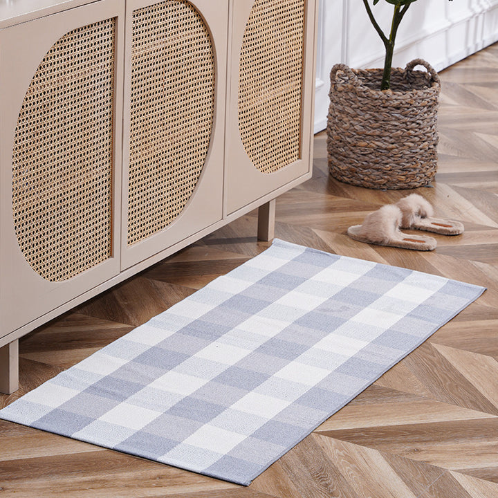 woven living room runner with fringes and geometric weave pattern