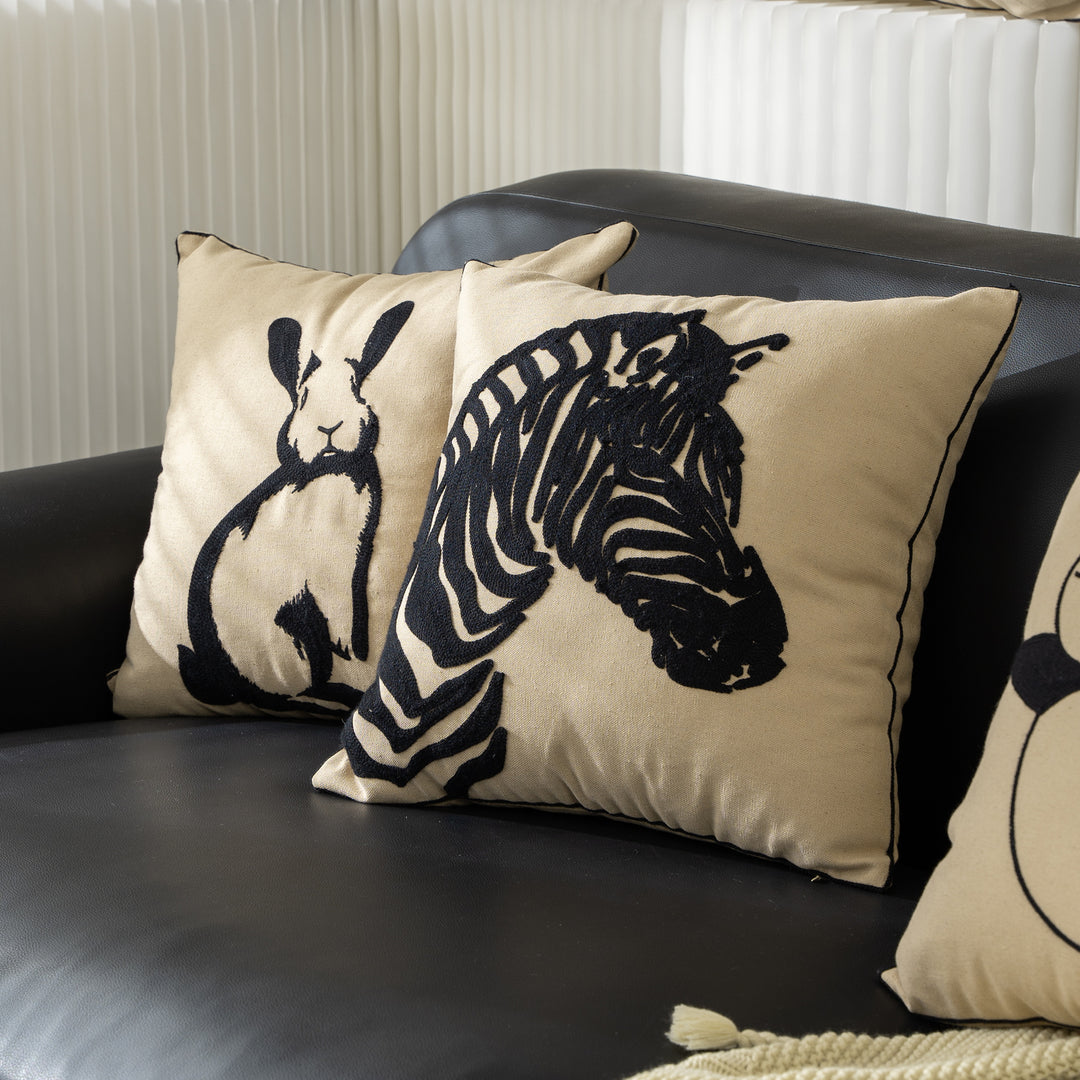 Cotton decorative pillow with raised dog tuft embroidery and contrasting piping