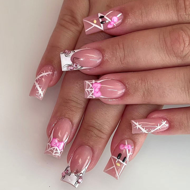 Decorative Nail Art Set with Bow and Spider Web Design