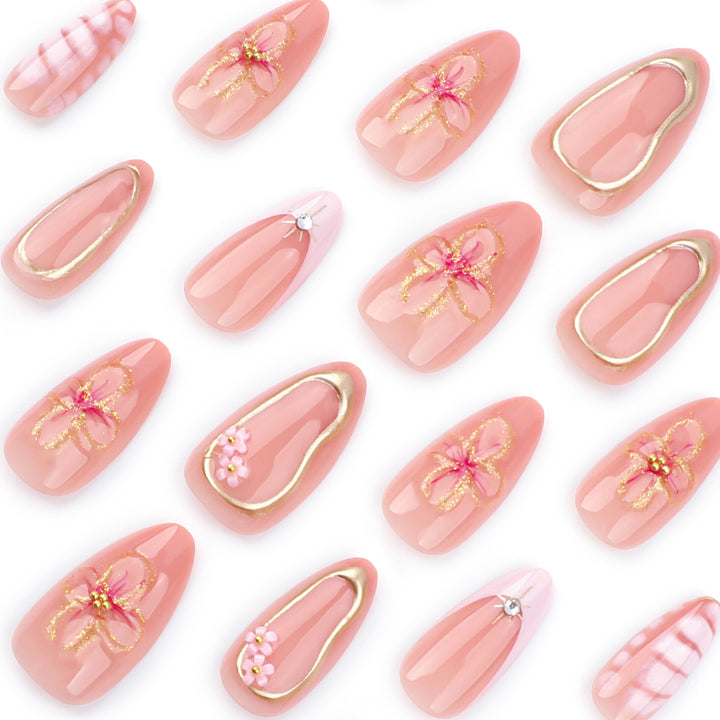 Artful nail design with glitter and floral accents Kalsten