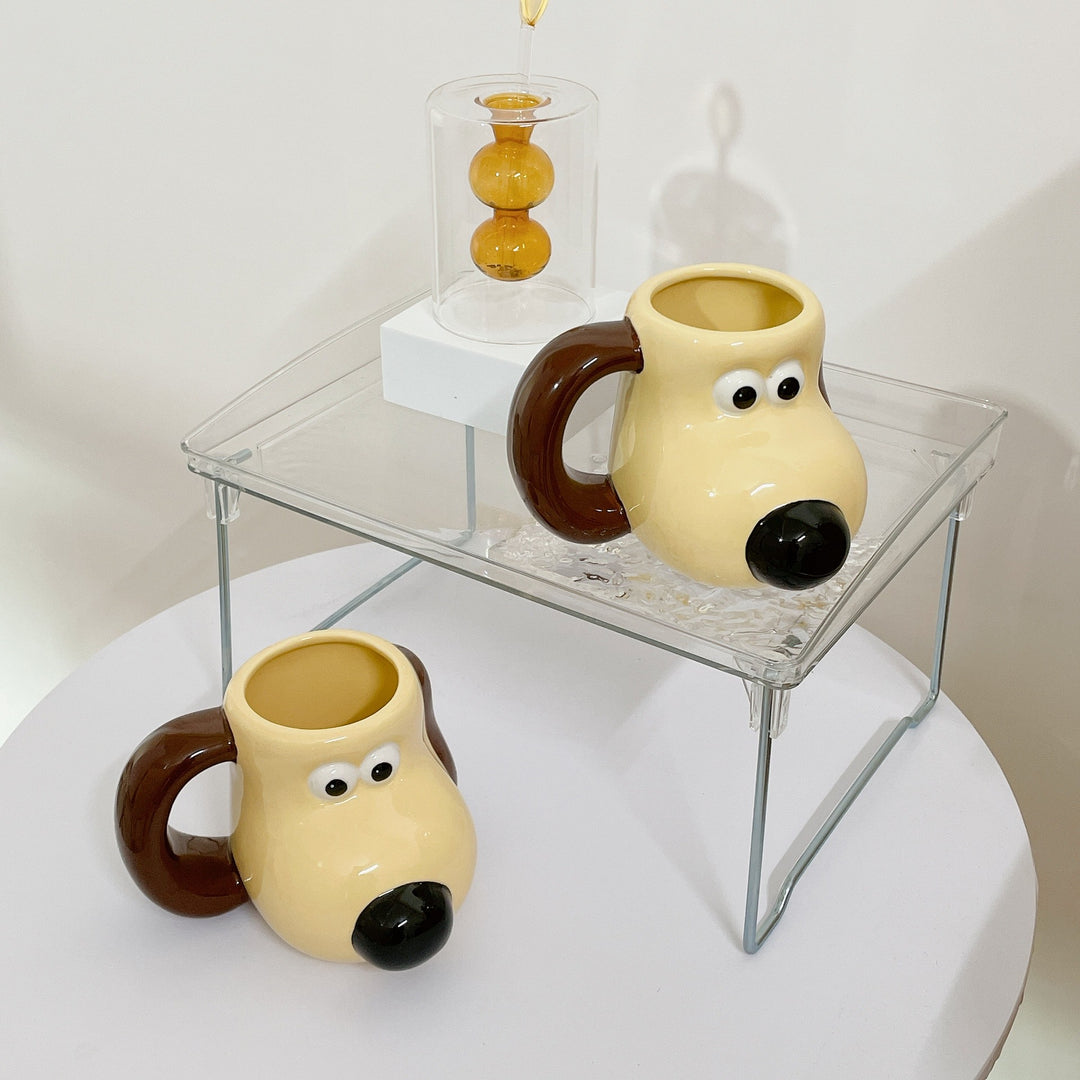 Playful ceramic dog-shaped coffee mug with ergonomic handle
