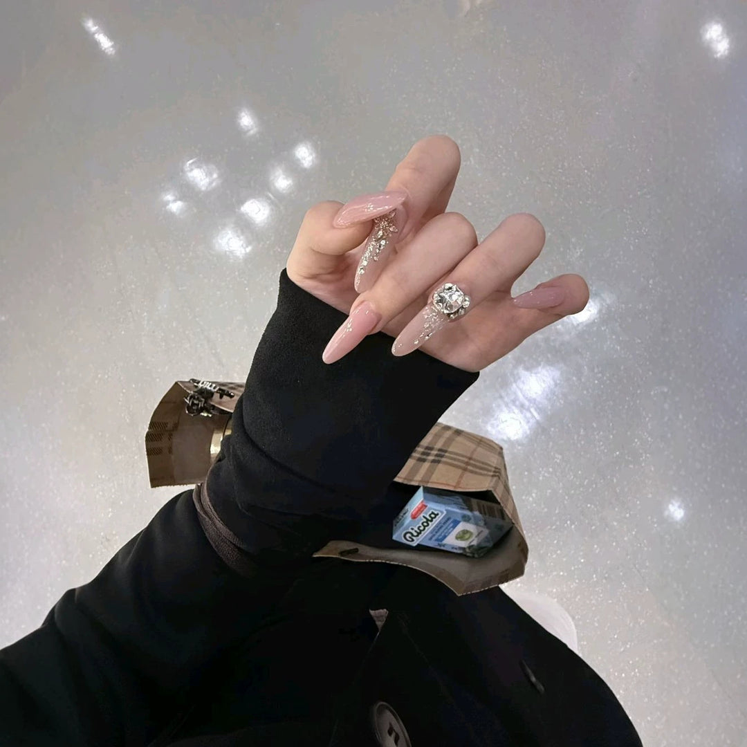 Elegant Stiletto Nail Extensions with Crystal Accents