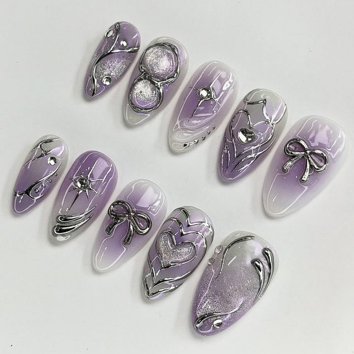 Artful Nail Art with Shiny Accents and Delicate Lilac Kalsten