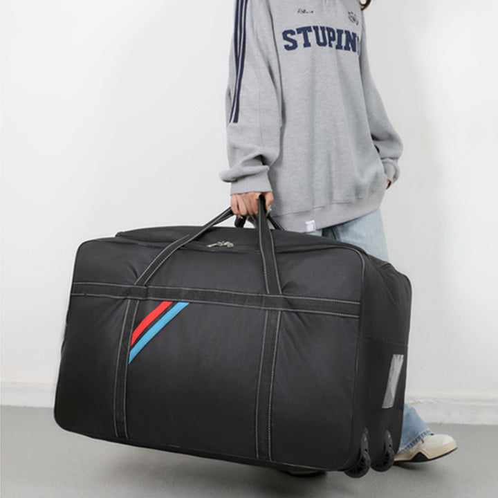 Spacious travel bag with lightweight wheels and reinforced carrying handle Kalsten