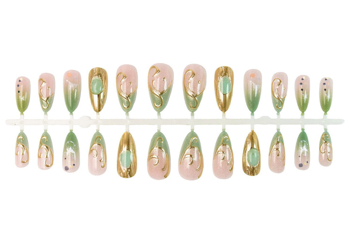 Nail art set with elegant gold accents and floral designs Kalsten
