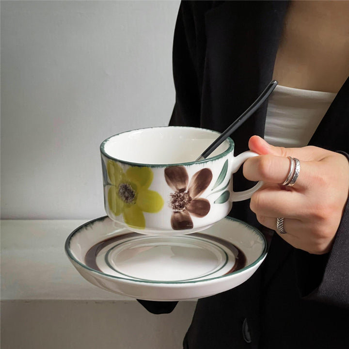 Porcelain cappuccino set with botanical brush painting and elegant rim decoration
