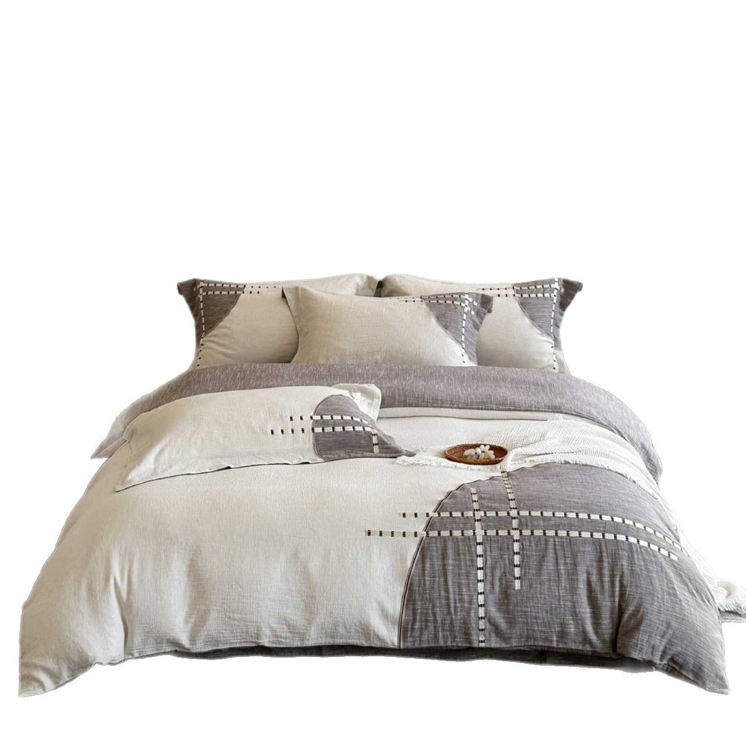 Reversible bedding set made of cotton-linen blend with embroidered check pattern