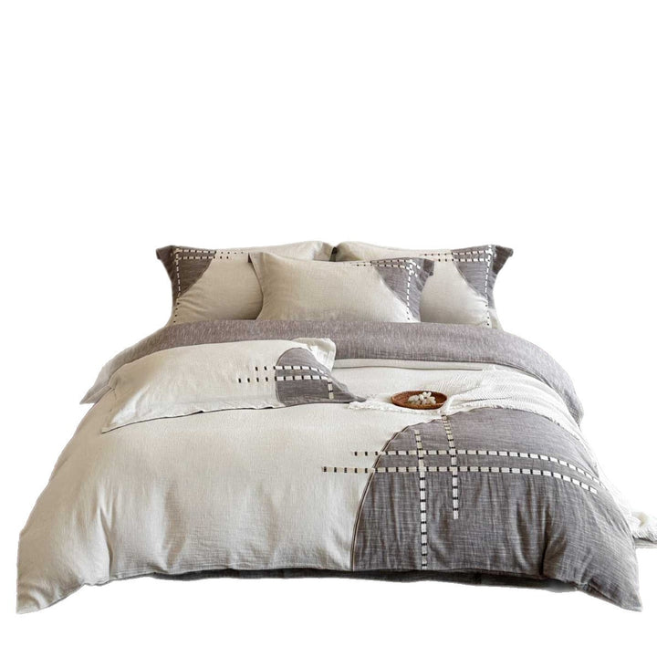 Reversible bedding set made of cotton-linen blend with embroidered check pattern