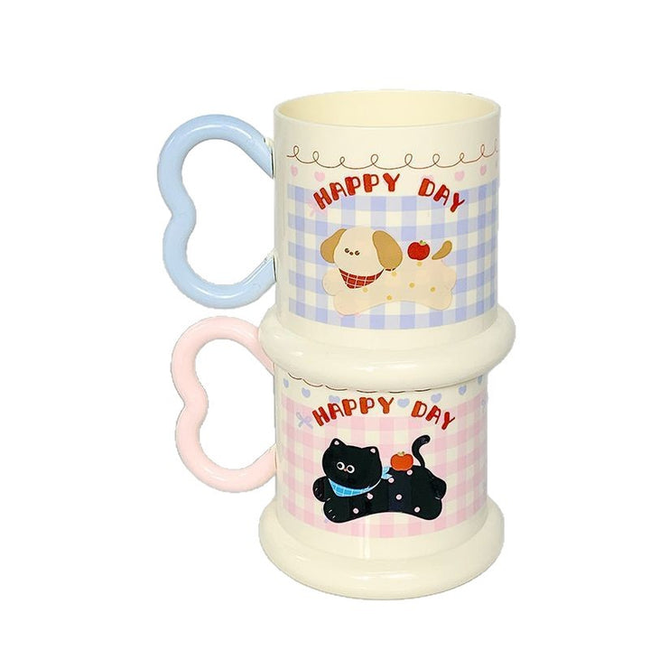 Ceramic mug with playful puppy motif Kalsten