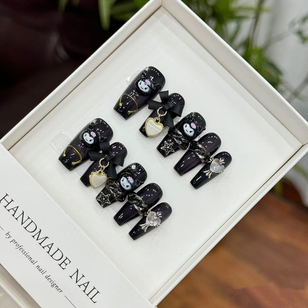 Artistic Themed Press-On Nail Set with Unique Charms and Designs
