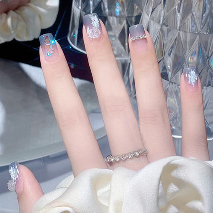 Glamorous artificial fingernails with glitter and moon designs Kalsten