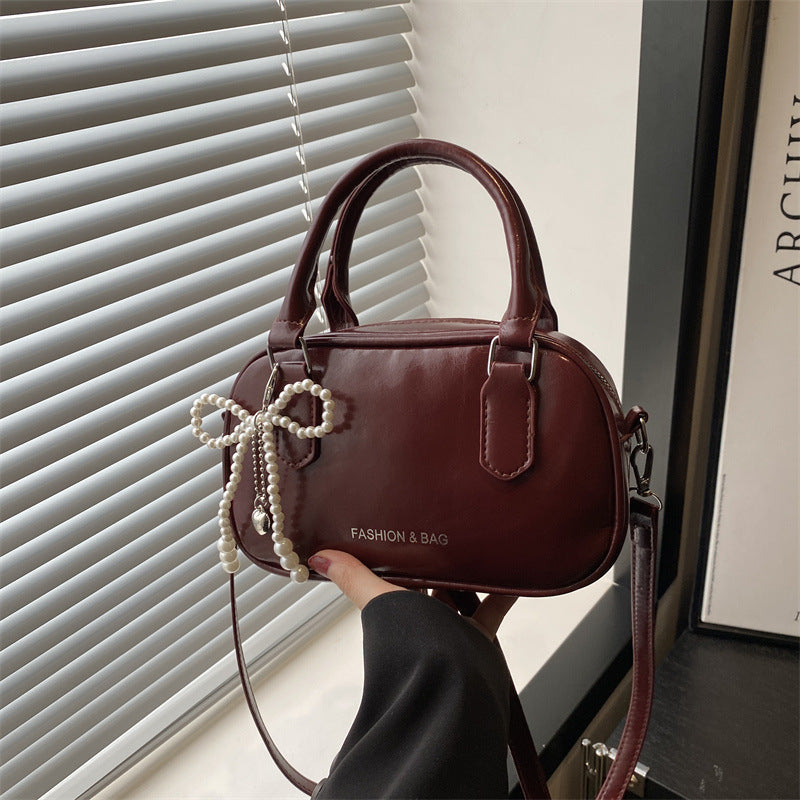 Elegant Pearl-Embellished Handheld Satchel