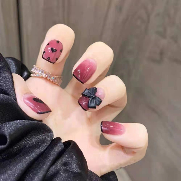 Themed Press-On Nail Set with Decorative Heart and Bow Designs