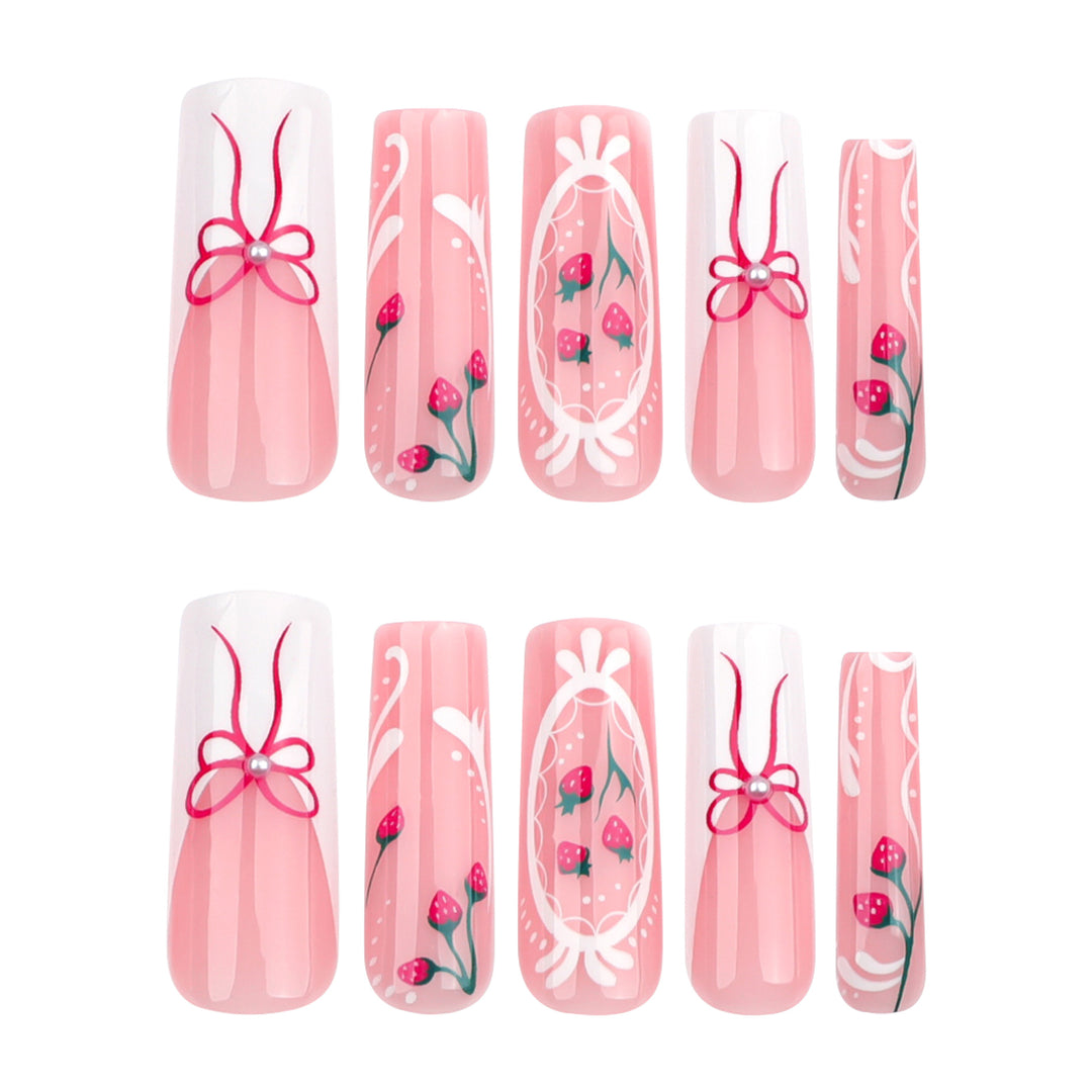 Artful nails with strawberry motifs and bow accents Kalsten