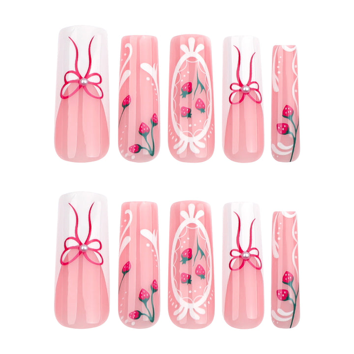 Artful nails with strawberry motifs and bow accents Kalsten