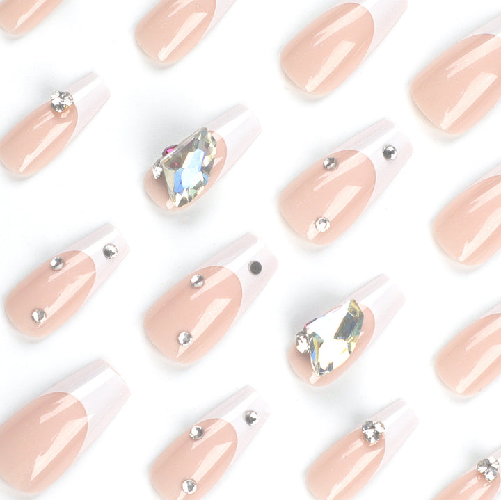 Artistic nail art with glitter accents and rhinestone embellishments Kalsten