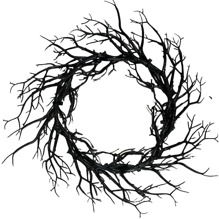 Halloween decorative wreath made of artificial branches with a natural branch look