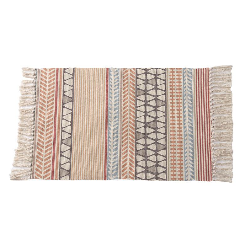 Handwoven cotton table runner with mandala jacquard and decorative fringes