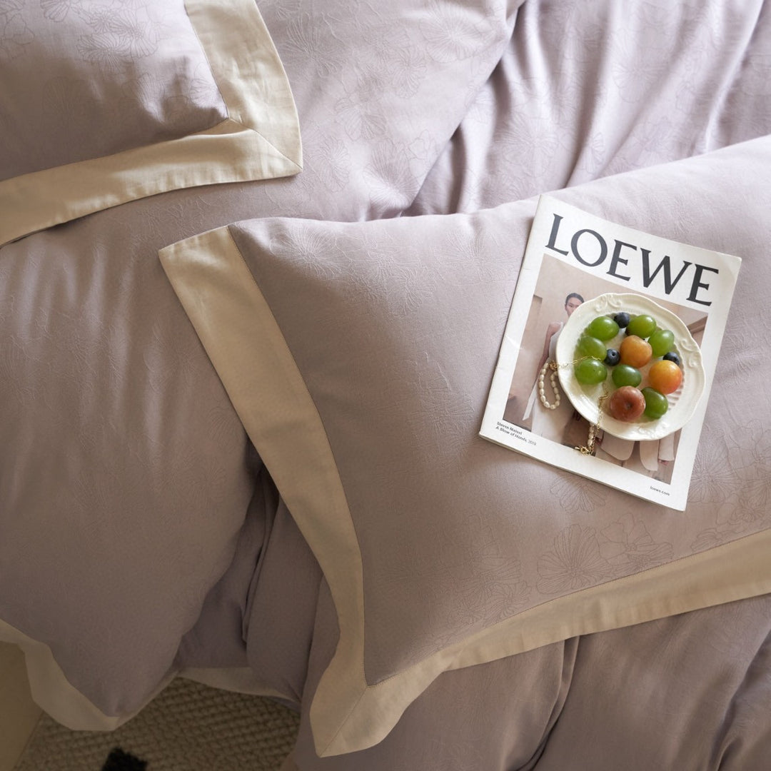 High-quality bedding set made of cotton satin with jacquard floral relief and contrasting hem finishing
