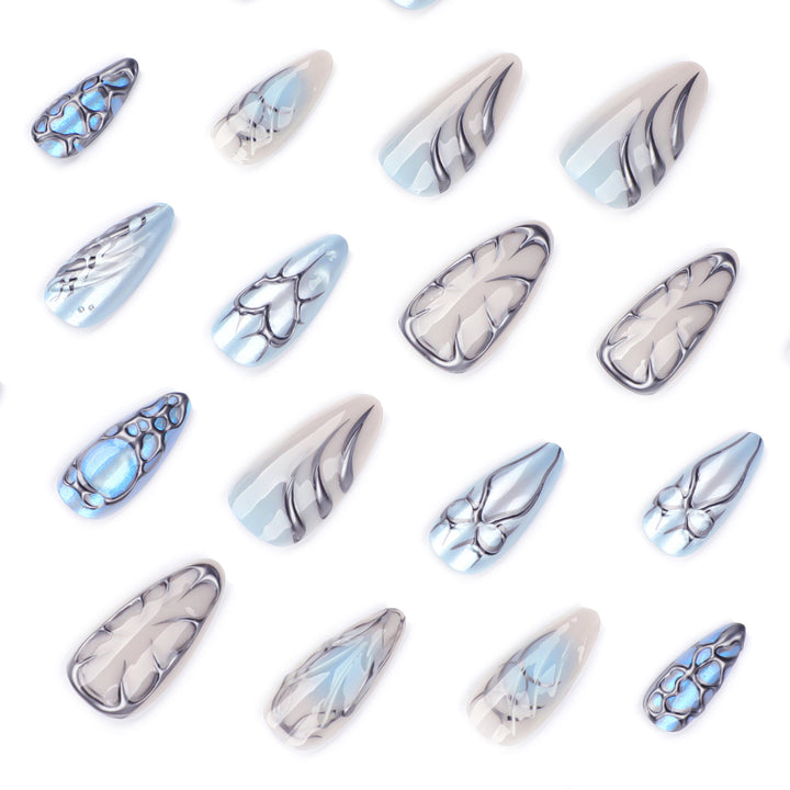 Artful stiletto nails with playful metallic details Kalsten