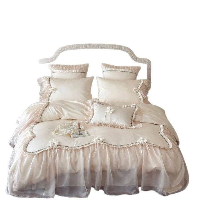Bedding set made of cotton satin with transparent organza ruffle and 3D flower appliqué