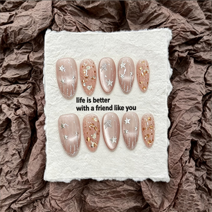 Artistic Press-On Nail Set with Stellar Design