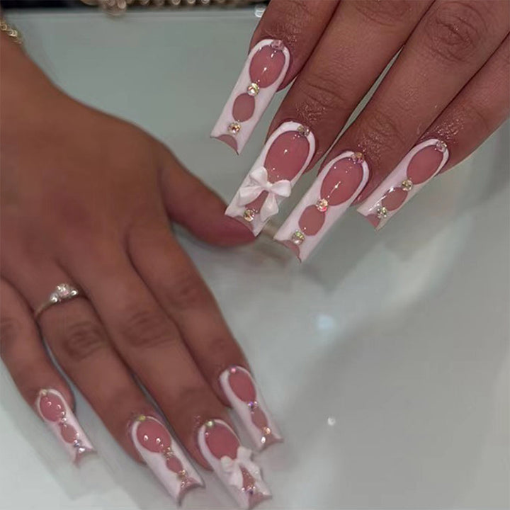 Elegant and artistic nail art with rhinestone details Kalsten