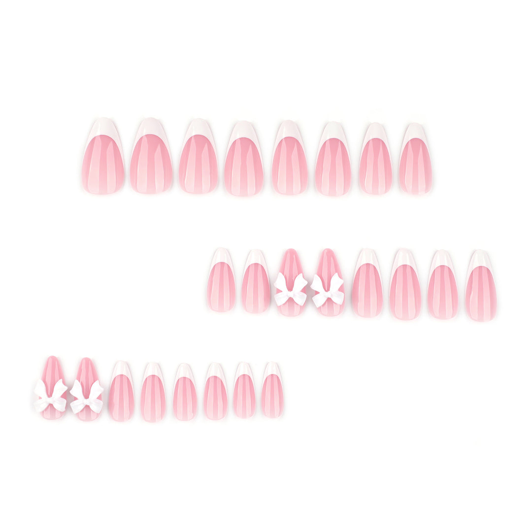 Artful nail designs with elegant tips and delicate bow motifs Kalsten