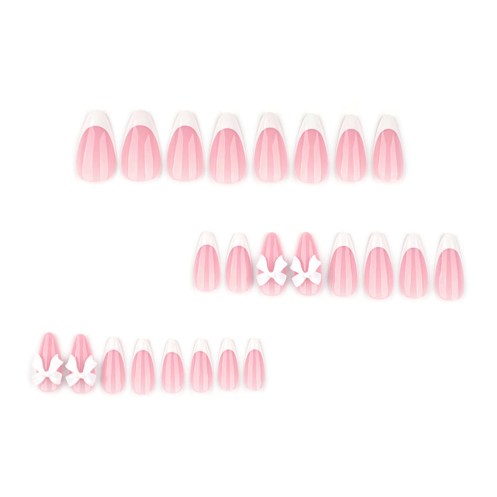 Artful nail designs with elegant tips and delicate bow motifs Kalsten