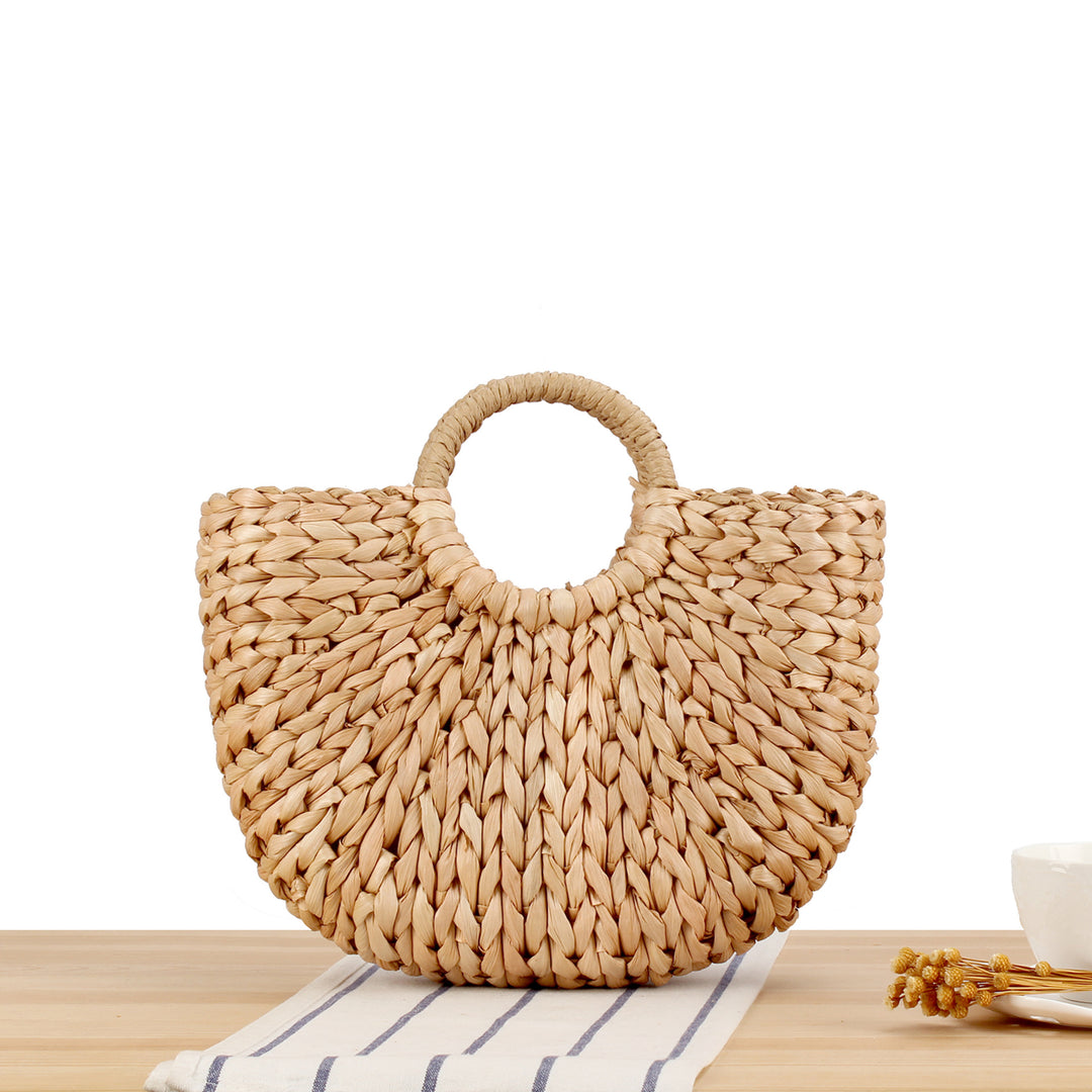 Tote bag made of handmade natural material with elegant round handle Kalsten
